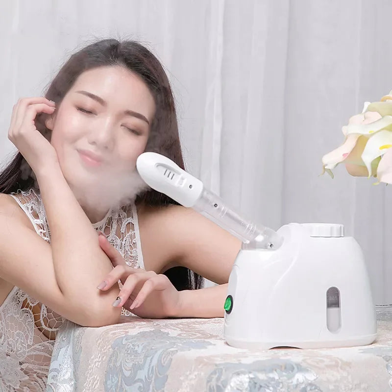 Appareil vapozone facial à vapeur chaude avec fonction ozone, conçu pour un nettoyage en profondeur et une hydratation optimale de la peau. Idéal pour un usage à domicile ou en institut, il aide à ouvrir les pores, purif