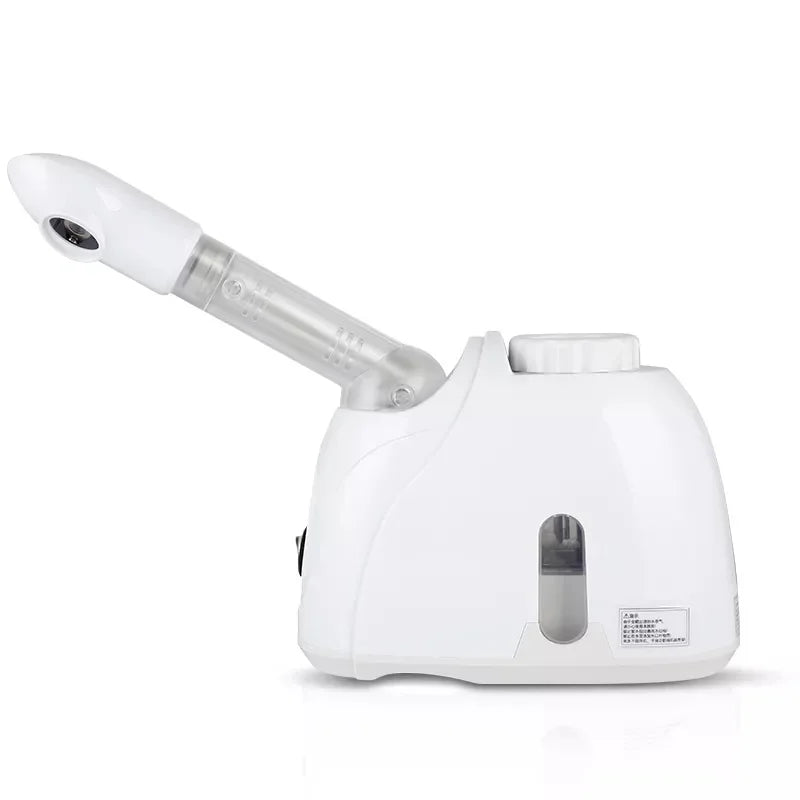 Appareil vapozone facial à vapeur chaude avec fonction ozone, conçu pour un nettoyage en profondeur et une hydratation optimale de la peau. Idéal pour un usage à domicile ou en institut, il aide à ouvrir les pores, purif