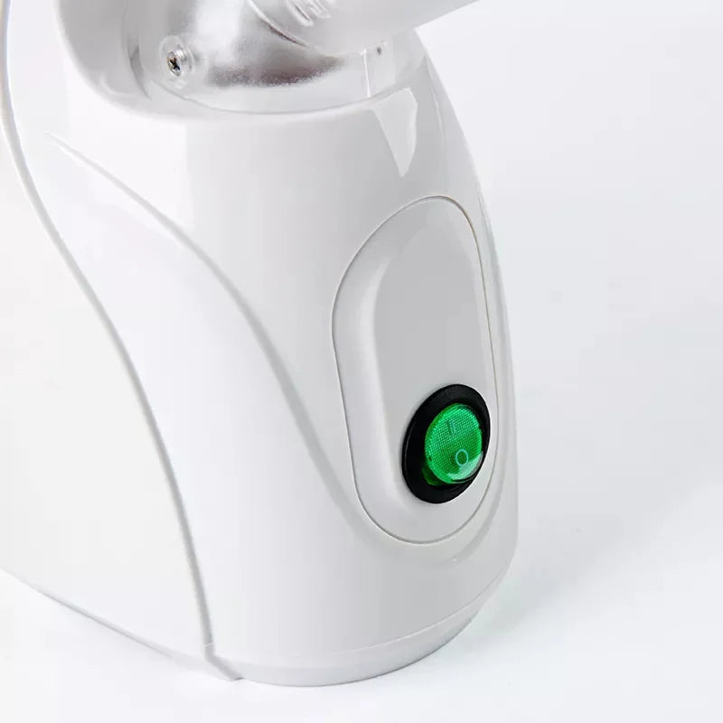 Appareil vapozone facial à vapeur chaude avec fonction ozone, conçu pour un nettoyage en profondeur et une hydratation optimale de la peau. Idéal pour un usage à domicile ou en institut, il aide à ouvrir les pores, purif