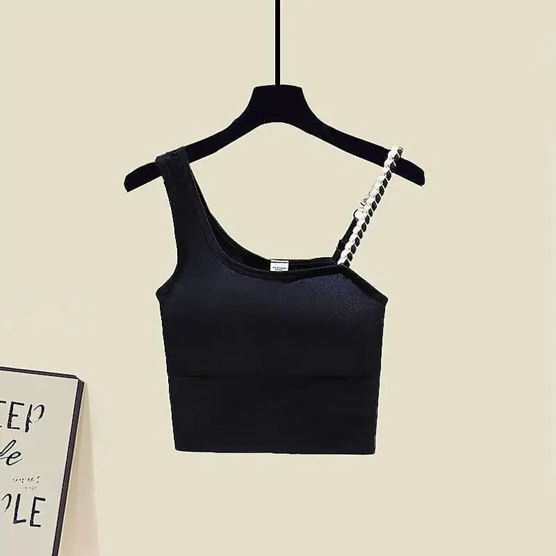 Sleek black crop top on a hanger, featuring one strap and trendy design, perfect for casual wear.