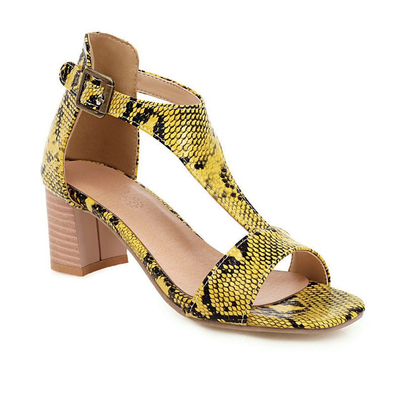 Snakeskin high-heeled chunky sandals.
