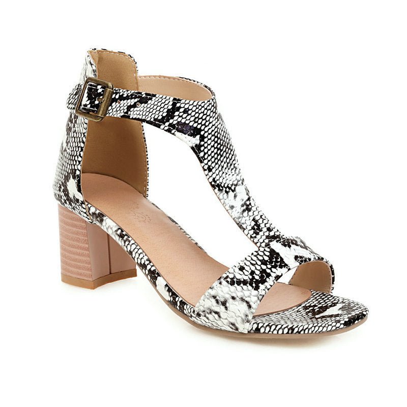 Snakeskin high-heeled chunky sandals.