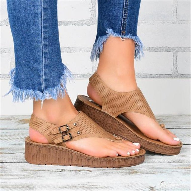 Women's hollow flat heel flip flops sandals.