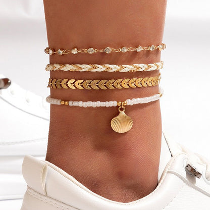 4pcs Set Bohemian Woven Rope Foot Chain For Men And Women Geometric Alloy Black Beads Dropping Oil Anklet Set Summer Fashion Jewelry.