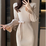 Robe pull femme automne/hiver – col V, manches évasées, coupe ajustée