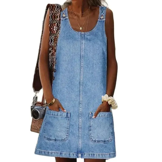 Robe en jean pour femme, sans manches, avec boutons sur le devant et deux poches pratiques. Confortable et légère, idéale pour l’été. Parfaite pour un look décontracté ou pour vos sorties quotidiennes.