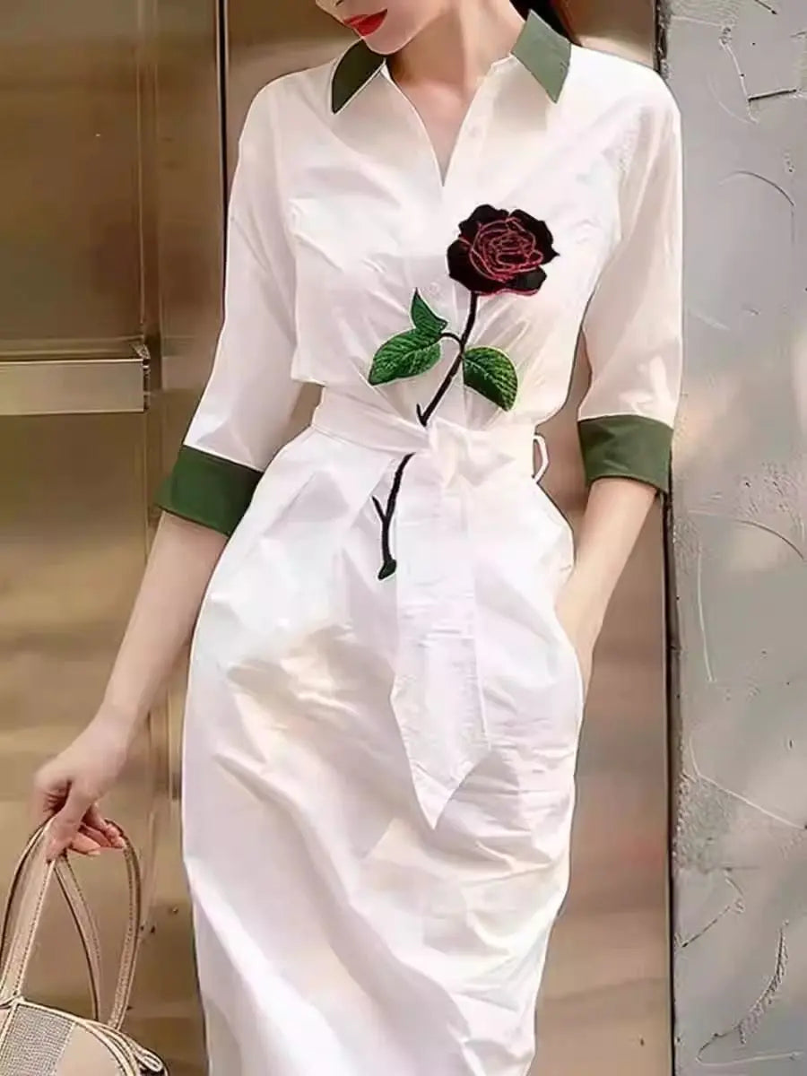 Robe chemise blanche imprimée, style été, légère et élégante, inspirée du chic français. Parfaite pour un look raffiné et décontracté.