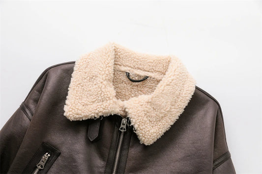 Manteau femme chaud en fausse fourrure shearling, style vintage ceinturé.