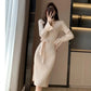 Robe pull femme automne/hiver – col V, manches évasées, coupe ajustée