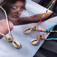 Contrasting Beige Shell Necklace.