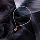 Contrasting Beige Shell Necklace.