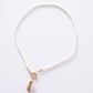 Contrasting Beige Shell Necklace.