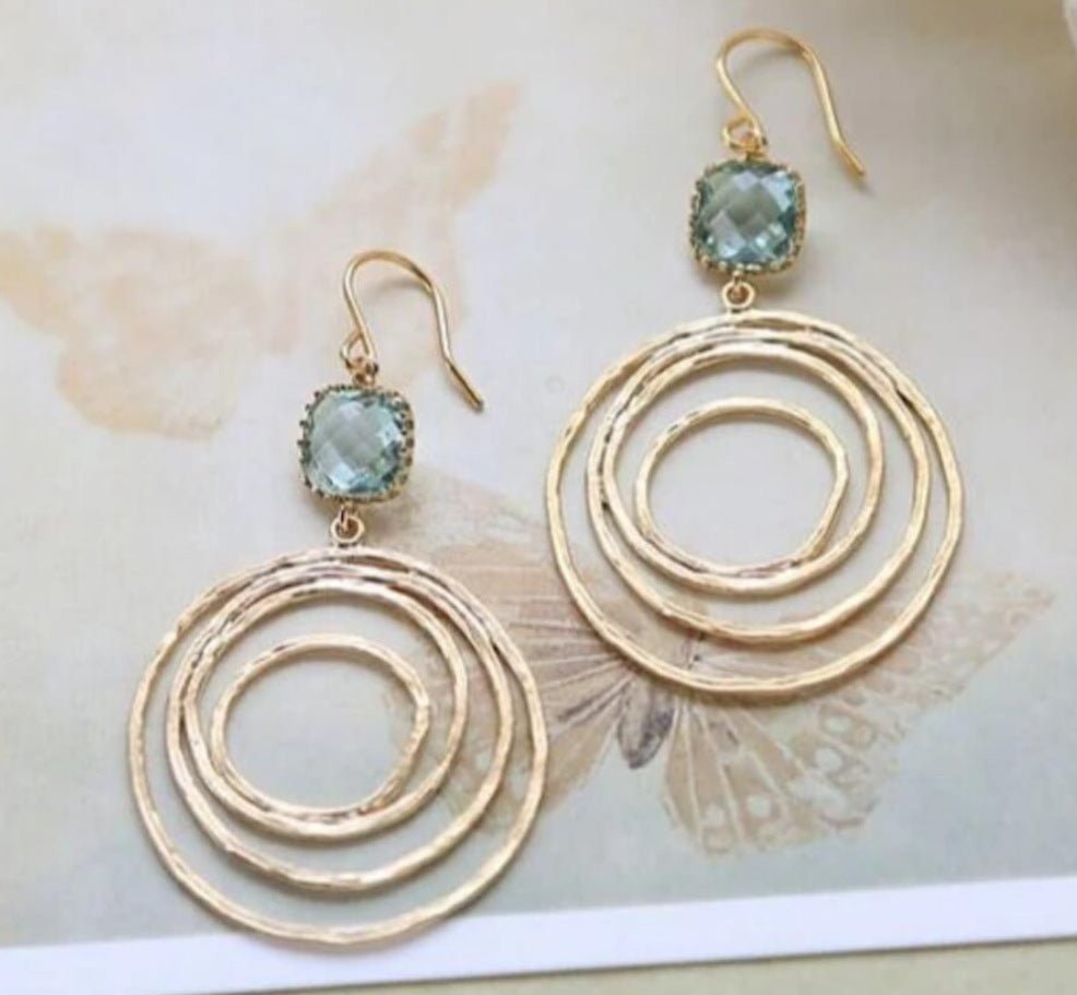 European And American Fashion Creative Hollow Round Vortex Inlaid Sapphire Earrings.