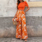 Top orange à manches bouffantes + pantalon fluide imprimé feuilles Taille haute flatteuse – Parfait pour la plage, les vacances ou une sortie entre copines.Léger, color block, 100 % glamour..