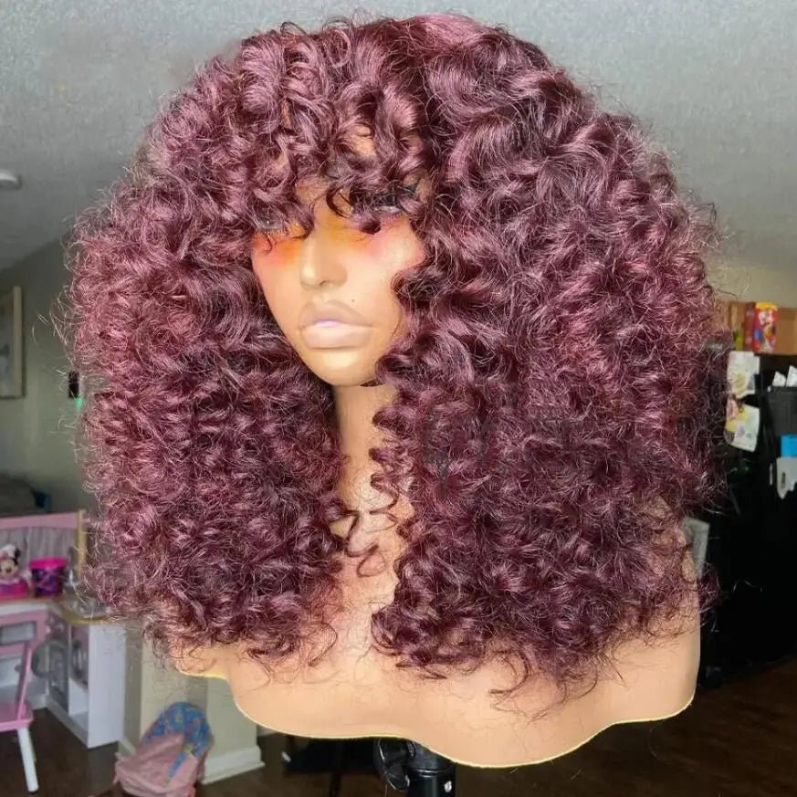 Long Kinky Curly 99J wig in deep burgundy with bangs, 100% heat-resistant synthetic hair, 180% density, pre-plucked.