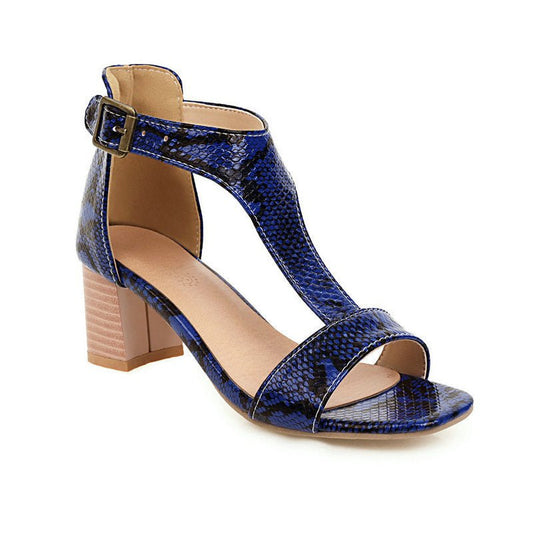 Snakeskin high-heeled chunky sandals.