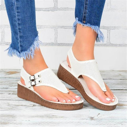 Women's hollow flat heel flip flops sandals.