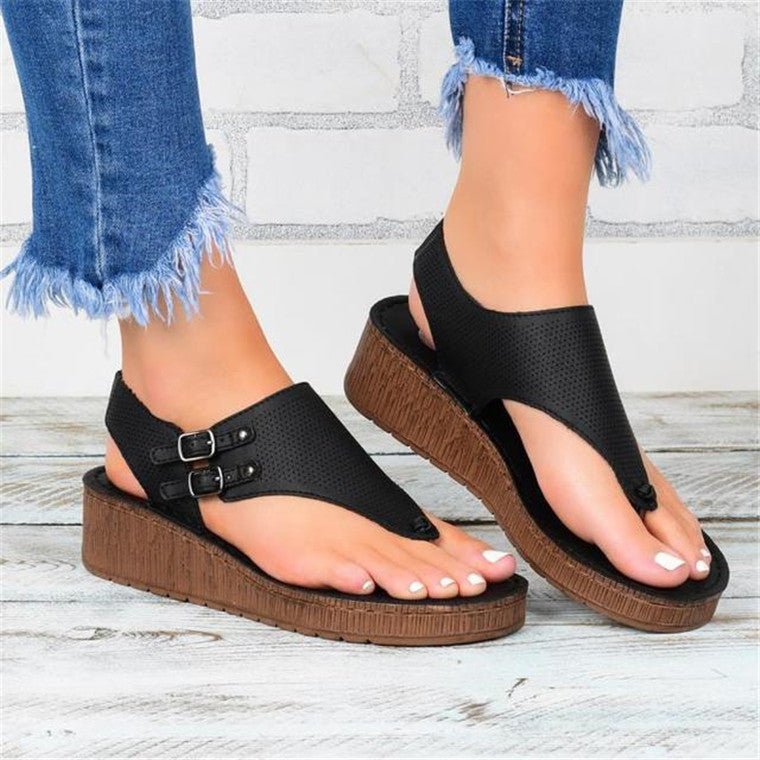 Women's hollow flat heel flip flops sandals.